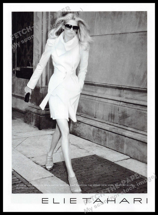White House Black Market 2010s Print Advertisement 2010 Legs Sidewalk Working Fetch-the-Paper