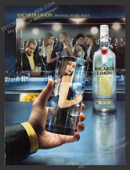 2002 Bacardi Limon Girl in Glass Reflection Alcohol Print Advertisement.