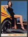 Charles David 2000s Print Advertisement 2001 Long Legs Racecar Tire Shoes Feet Fetch the Paper!