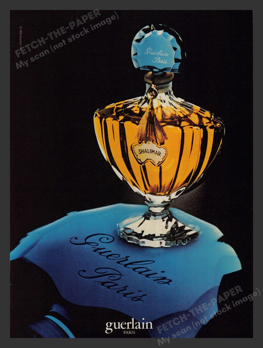 Guerlain 1980s Print Advertisement Ad 1983 Perfume Shalimar Paris Blue Fetch the Paper!