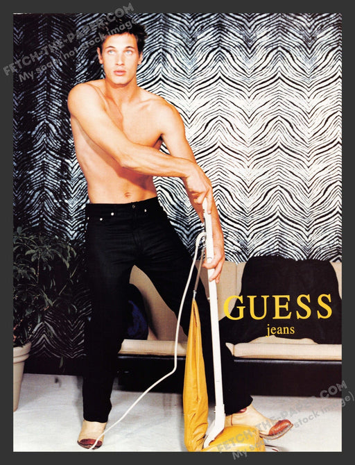 2000 Guess Jeans Sexy Male Model Vacuuming Print Advertisement.