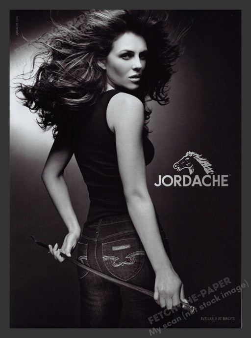 Jordache 2000s Print Advertisement 2007 Elizabeth Hurley Jeans Whip Actress Fetch the Paper!