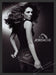 Jordache 2000s Print Advertisement 2007 Elizabeth Hurley Jeans Whip Actress Fetch the Paper!