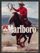 1983 Print Advertisement Marlboro Country Cigarettes Cowboy Gallop Rope Ad.