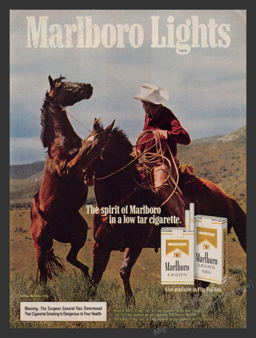 1985 Marlboro Lights Cigarettes Cowboy Roped Rearing Mustang Print Advertisement