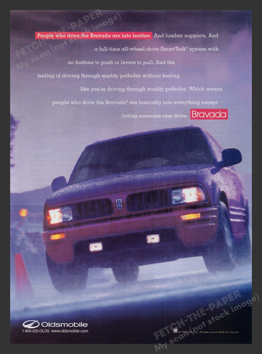 Oldsmobile Bravada Rain Driving 1990s Print Advertisement Ad 1996 Fetch the Paper!