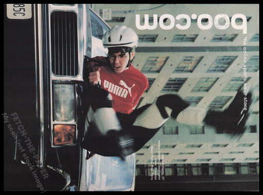 Puma Clothing 1990s Print Advertisement Ad 1999 Fetch the Paper!