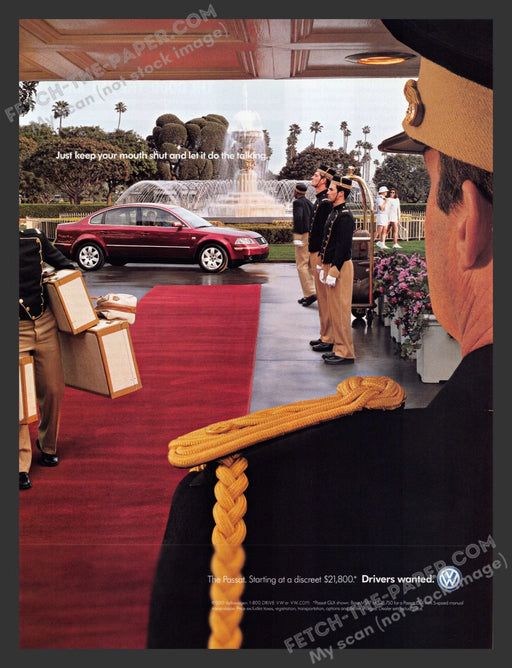 2001 VW Volkswagen Passat Bell-hop Red Carpet Print Advertisement.